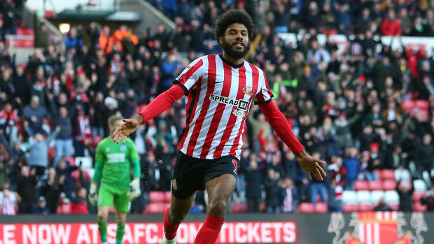Ellis Simms celebrates